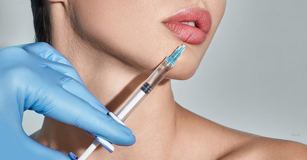Woman receiving injectable filler